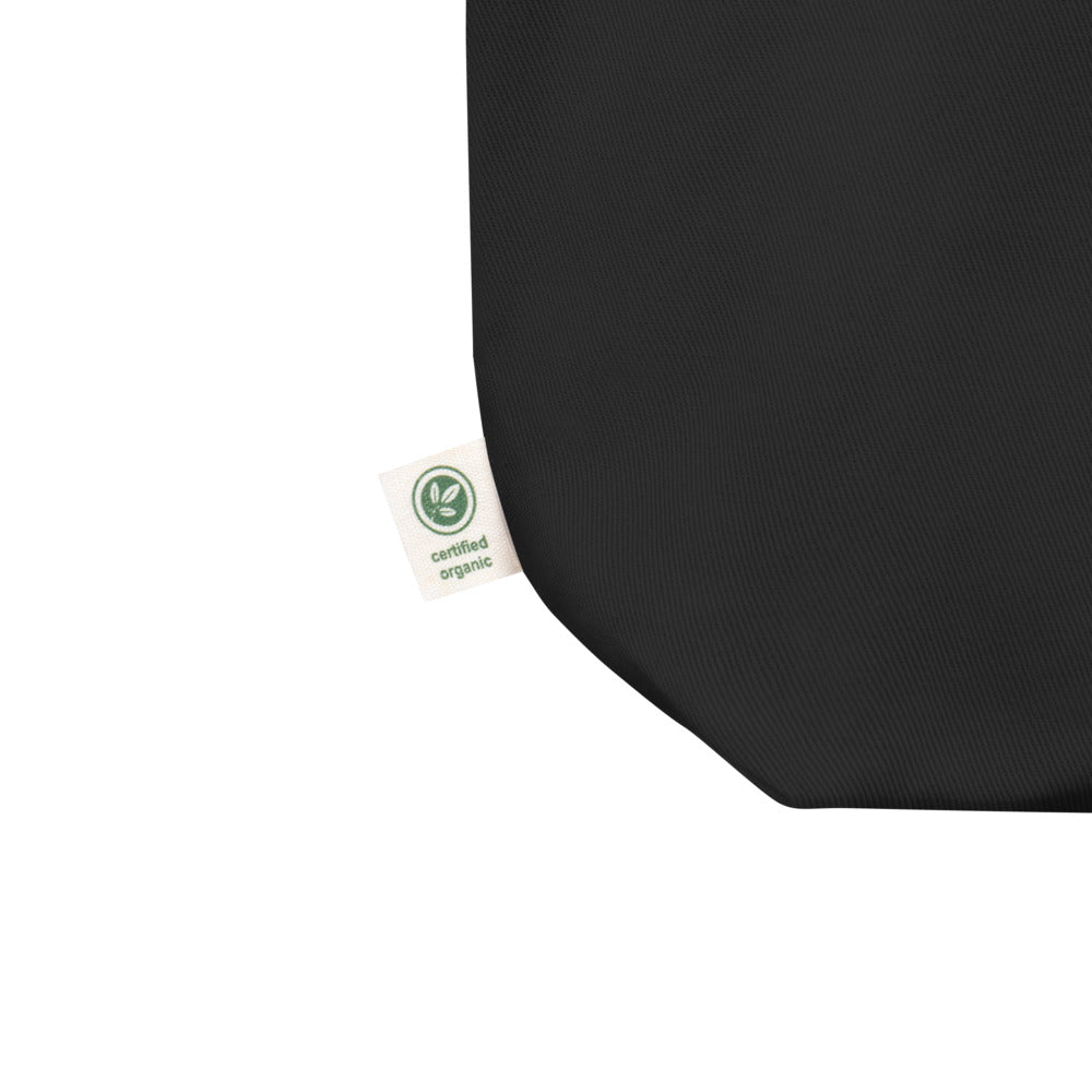 Certified organic tag of a black eco tote bag.