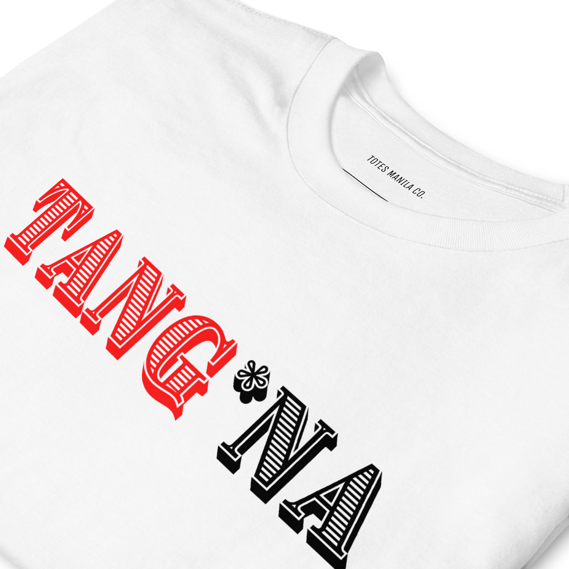 Close up of the Tang*Na design printed on the center chest of a white unisex cotton shirt.