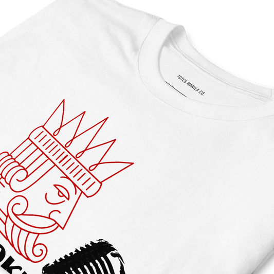 Close up view of the Karaoke King design printed on the center chest of a white unisex shirt.