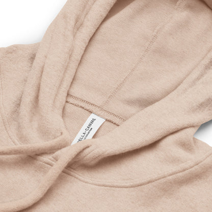 Close up of the product details of the Filipina Statement Fleece Hoodie in color Heather Oat.