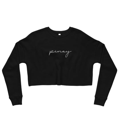 Flat lay view of a cropped sweatshirt embroidered with the 'Pinay' design.