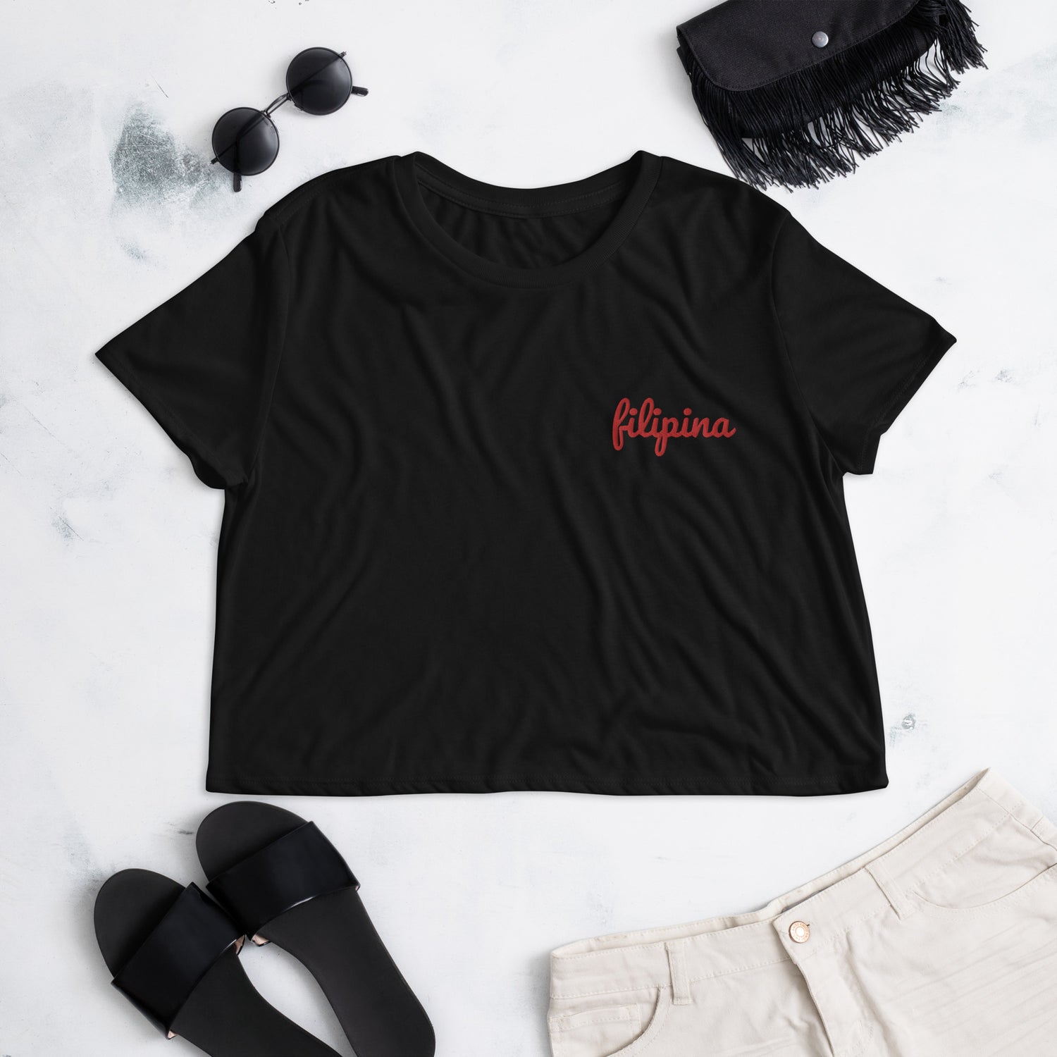 Lifestyle view of the Filipina Embroidered Statement Flowy Crop Top in color Black.